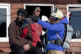 Oxana Chekoulaeva and Gudauri ski patrol. Photo: D. Pudenko