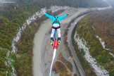 Russia. Sochi region. "SkyPark AJ Hackett Sochi". Konstantin Galat drop 207-meter Bungy. Photo: GoPro cam